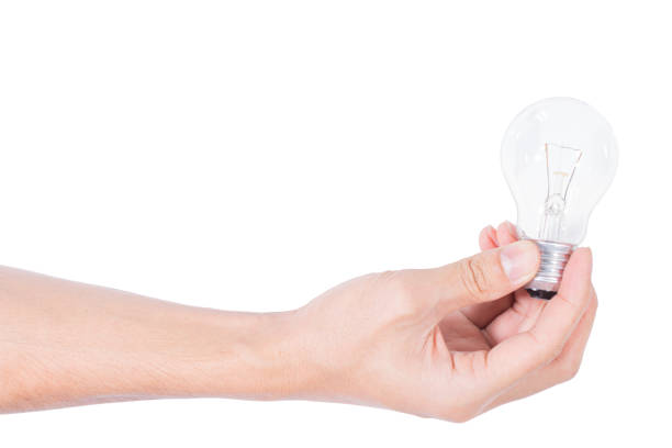 istock The hand of the light bulb in the white background 1329606412
