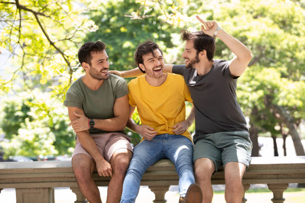 istock Three young men making self portraits and having fun at Buenos Aires 1329606434