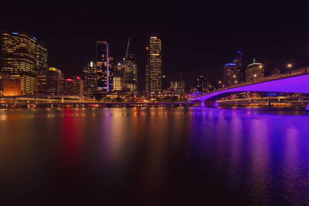 Brisbane’s city skyline at night, with lights reflected on the Brisbane River. The Queensland capital is the likely host of the 2032 Olympic Games.