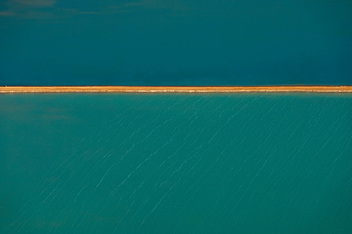 Aerial photography, Useless Loop, Shark Bay, Western Australia, June 2021, abstract images of salt ponds pattern from above in varying colors of turquoise, teal, sapphire, cobalt, indigo blue hues