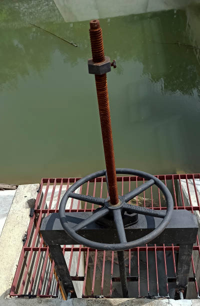 istock big valve for opening and closing the dam. 1329608711