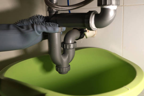 istock Cropped Hands Of Plumber Repairing Pipe 1329609461