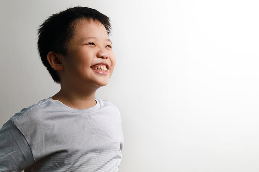 Portrait of a little Asian boy smiling