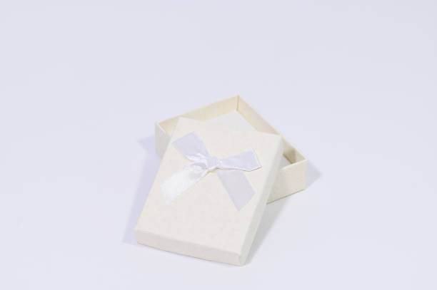 istock Creamy white gift box In the white background 1329617167