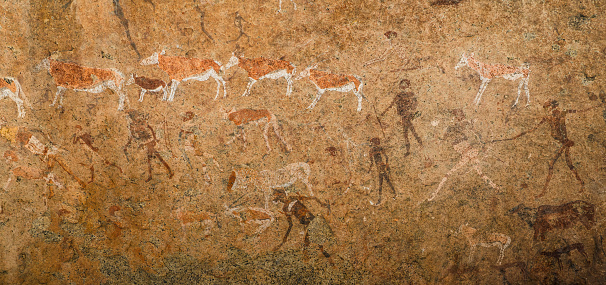 Panorama of ancient prehistoric cave painting known as the White Lady of Brandberg dating back at least 2000 years and located at the foot of Brandberg Mountain in Damaraland, Namibia, Africa.