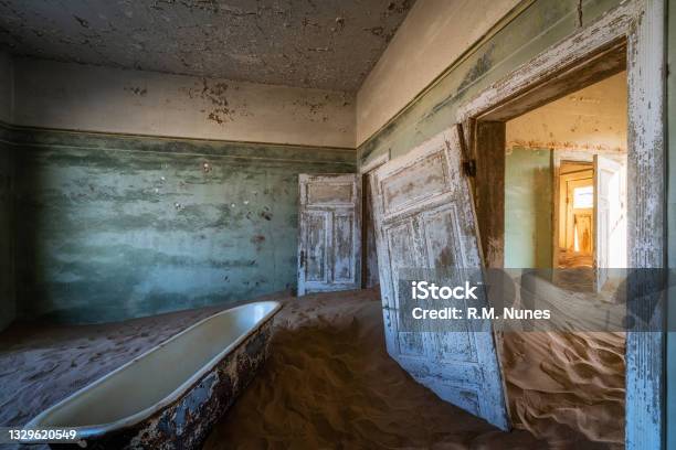 Abandoned Building In The Ghost Town Of Kolmanskop Near Luderitz Namib Desert Namibia Africa Stock Photo - Download Image Now