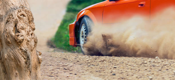 istock Rally race car drifting on dirt track. 1329620571