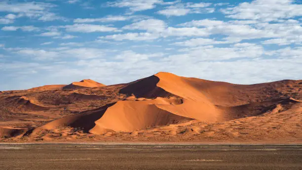 Dramatic desert landscape near Sossusvlei in the Namib-Naukluft National Park, Namibia, Africa.