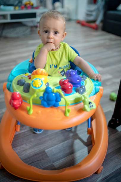 istock Baby in baby walker 1329627532