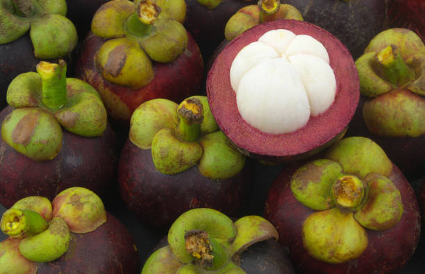 istock Mangosteen fruitsbackground 1329628314