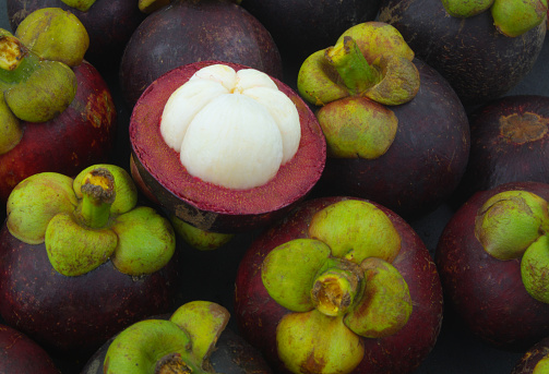 Ripe mangosteen fruits as background