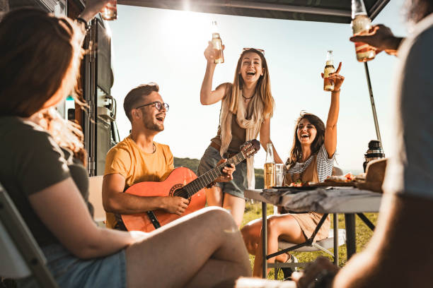 istock Guitar music on camping! 1329630619