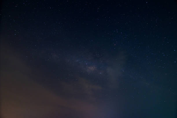 istock Milky way sky and stars at night 1329630880