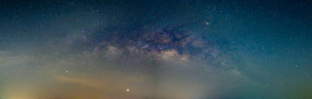 istock Panorama sky stars night milky way 1329630886