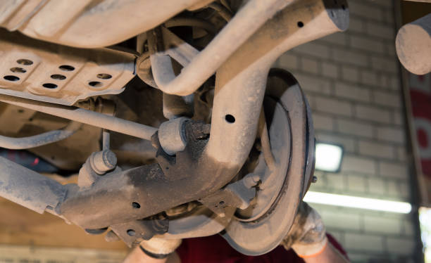 istock Rusty lower longitudinal and transverse rear rods on an old car 1329632233