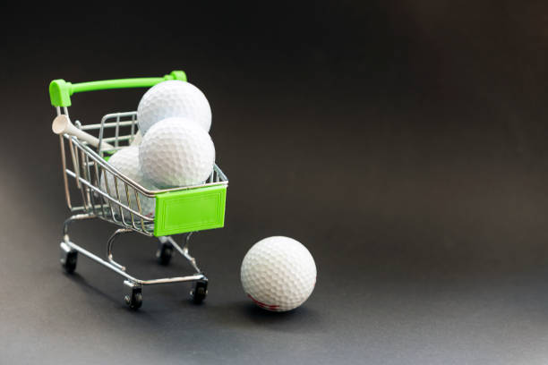 istock golf ball on tee on green background text here 1329633057