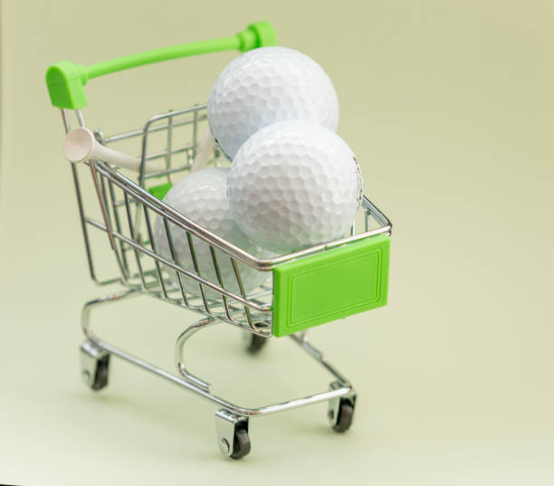 istock golf ball on tee on green background text here 1329633176