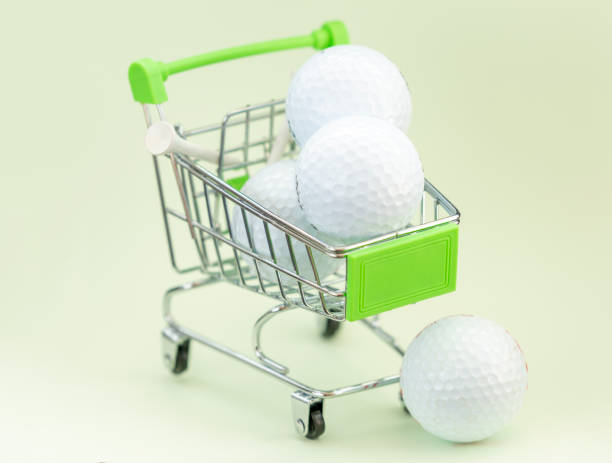 istock golf ball on tee on green background text here 1329633259