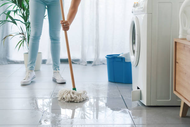 istock Broken washing machine leaking on the floor 1329635750