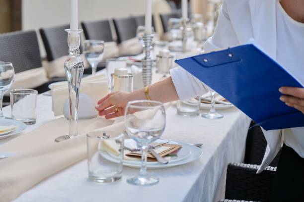Catering for events, banquet decorated table, table setting decoration.
