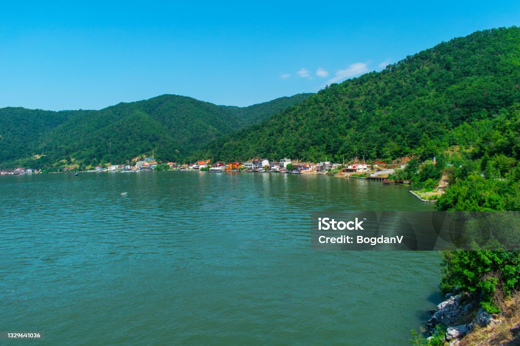 Houses, villas and boarding houses on the Danube bank, in Romania. Beautiful landscape on the Danube. Beauty Stock Photo