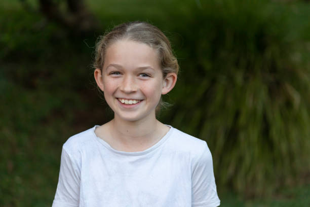 istock Happy young girl portrait 1329641060