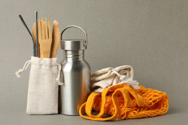istock Composition with eco friendly products on grey background. Conscious consumption 1329646183