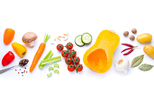 Garden vegetables set. Celery, pepper, beetroot, carrot, onion, garlic, ginger, tomato, cucumber and green bean isolated on white background. Healthy eating. Creative layout. Flat lay, top view