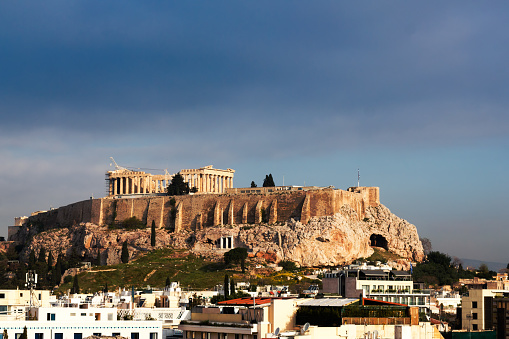 The ruins of an ancient greek temple. Parthenon on the Acropolis in Athens, Greece on a sunset