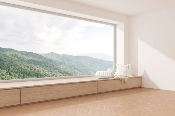 istock 3d rendering of modern empty room with wooden seat and herringbone floor on mountain background, Large window. 1329658731