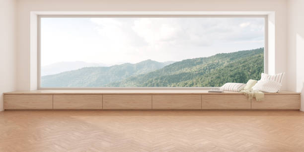 istock 3d rendering of modern empty room with wooden seat and herringbone floor on mountain background, Large window. 1329658740