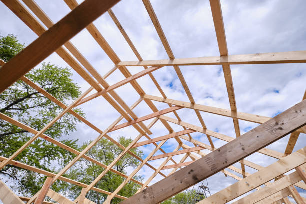 istock House under construction timber frame for a progressing house. Wooden roof in a building being built 1329659404
