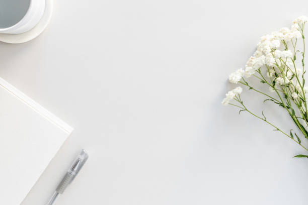 istock Flat lay of workspace with gypsophila flowers 1329660162