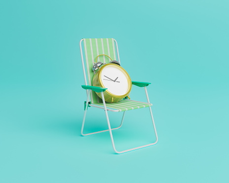 reloj en una silla de playa photo