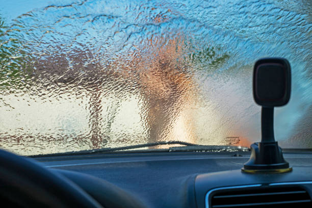 istock look through the blurred windshield of a car at a heavy downpour, flood 1329660800