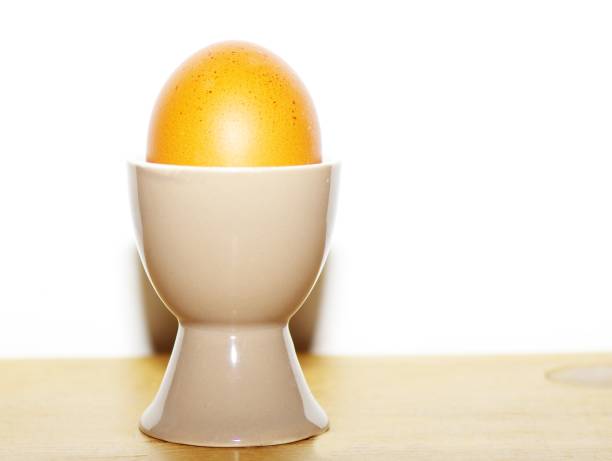 Egg cup with brown egg