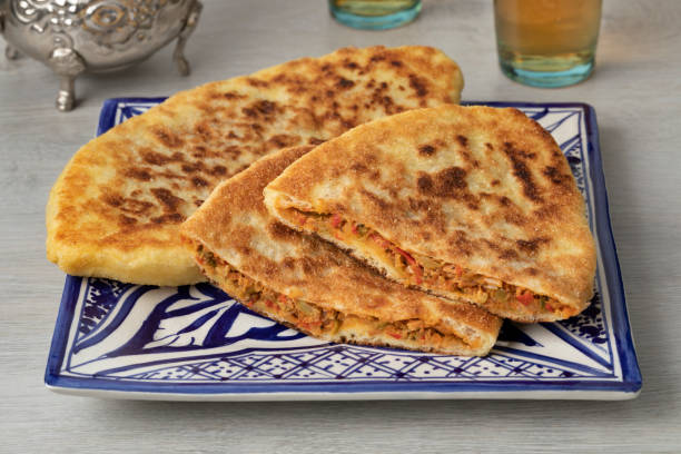 istock Plate with traditional fresh baked whole and half Moroccan stuffed batbot 1329662509