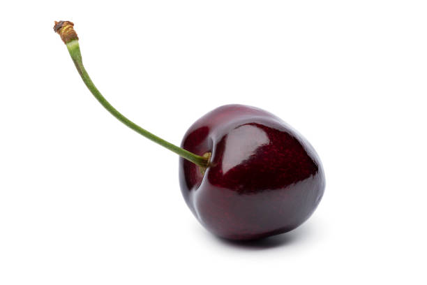 istock Single red ripe juicy cherry on white background 1329662563