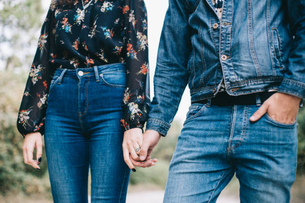 istock Girlfriend and boyfriend walk in the field. 1329664145
