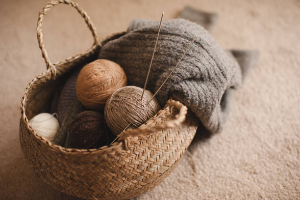 istock Knitting winter sweaters at home 1329665612