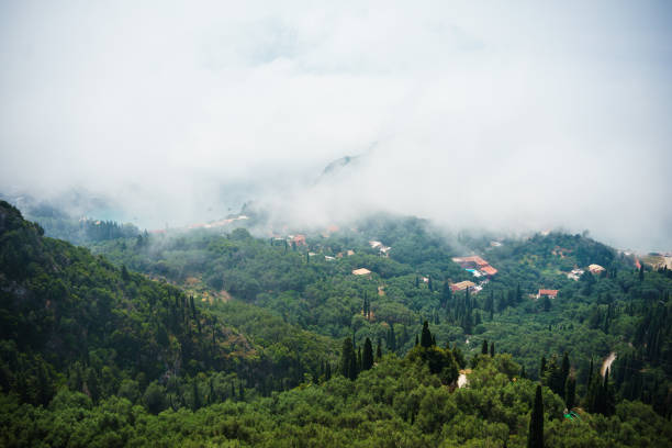 istock fog over mountains and sea 1329666600