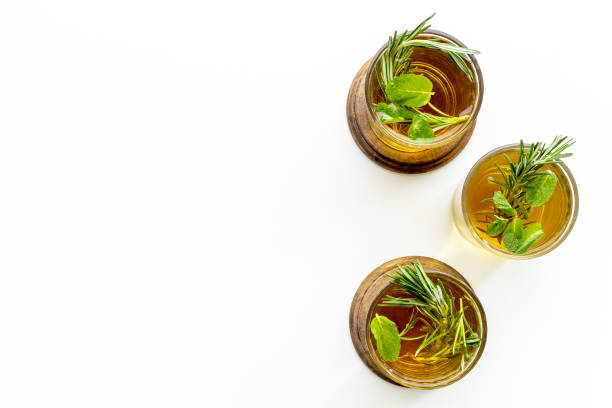 istock Fresh summer cocktail with cold tea and rosemary in glasses 1329673934