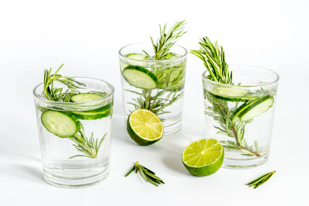 istock Homemade lemonade with cucumber lemon slices and herbs 1329674089