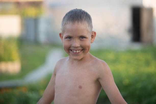 istock Portrait of a smiling boy 1329674413
