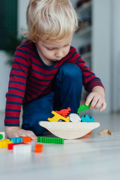 istock Boy Playing With Toys 1329675916