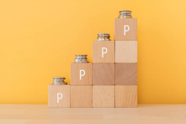 Point; Wooden blocks with "P" text of concept and money. Point; Wooden blocks with "P" text of concept and money. fidelity investments stock pictures, royalty-free photos & images