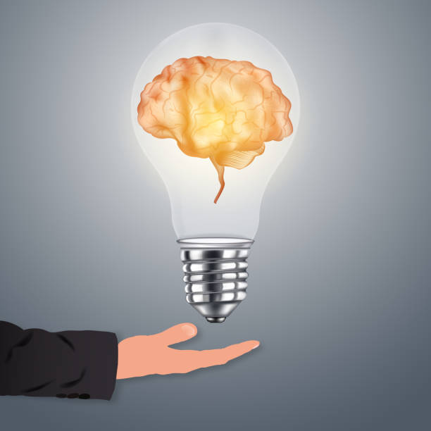 ビジネスアイデアの概念として暗い背景に電球の内側に輝く人間の脳。ベクトルイラストeps10。 - light bulb business wisdom abstract点のイラスト素材／クリップアート素材／マンガ素材／アイコン素材