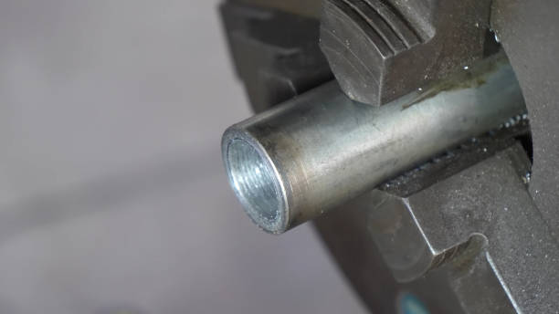 istock bushing in vise, bushing close in vise 1329687154