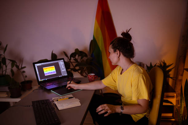 istock Dedicated female digital artist, using her creative abilities to create an amazing logo for LGBT community 1329687306