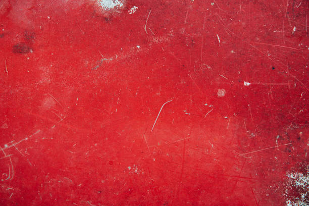 istock Aged red weathered metal background with cracks and scratches 1329687596